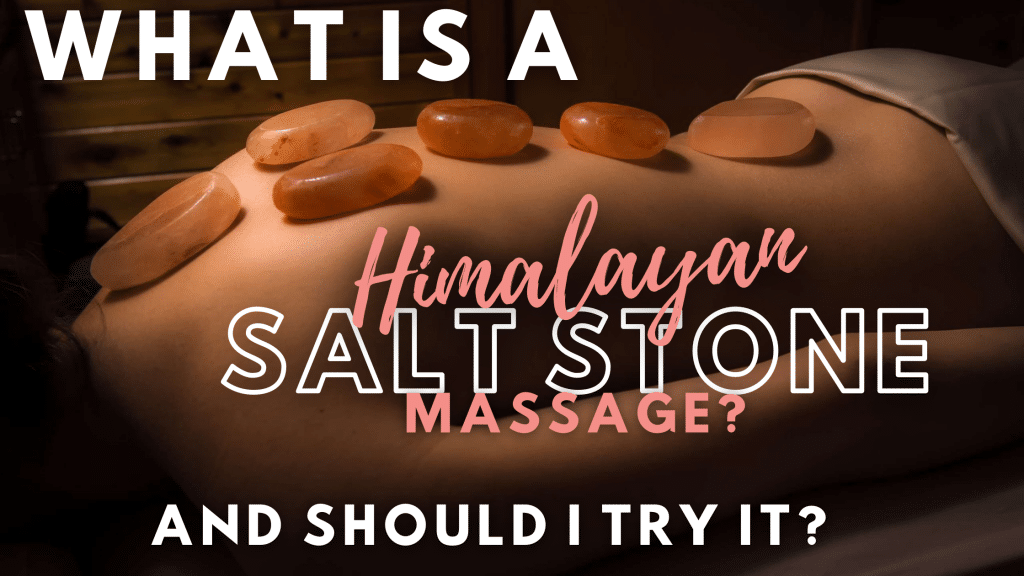 woman laying on her stomach with himalayan salt stones along her back with text stating "WHAT IS A HIMALAYAN SALT STONE MASSAGE AND WHY SHOULD I TRY IT?"